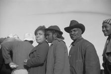 Possibly: Negroes in the lineup for food at mealtime in the camp..., Forrest City, Arkansas, 1937. Creator: Walker Evans