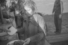 Possibly: Negroes in the lineup for food at mealtime in the camp..., Forrest City, Arkansas, 1937. Creator: Walker Evans