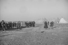 Possibly: Negroes in the lineup for food at mealtime in the camp..., Forrest City, Arkansas, 1937. Creator: Walker Evans