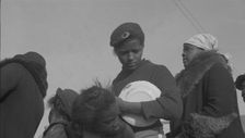 Possibly: Negroes in the lineup for food at mealtime in the camp..., Forrest City, Arkansas, 1937. Creator: Walker Evans