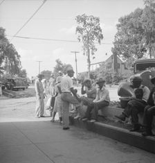 Possibly: Saturday afternoon shopping and visiting on main street of Pittsboro, North Carolina, 1939 Creator: Dorothea Lange