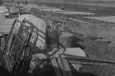 Possibly: Setting up a tent in the camp for white flood refugees, Forrest City, Arkansas, 1937. Creator: Walker Evans