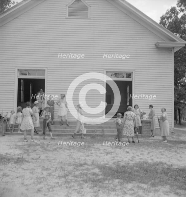 Possibly: Services are over, Wheeley's Church, Gordonton, Person County, North Carolina, 1939. Creator: Dorothea Lange.