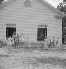 Possibly: Services are over, Wheeley's Church, Gordonton, Person County, North Carolina, 1939. Creator: Dorothea Lange