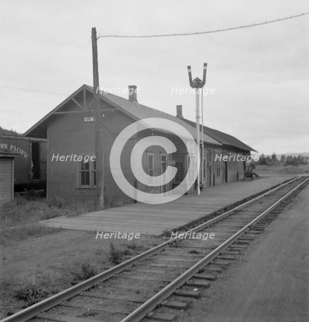 Possibly: Railroad station of western Washington town, Elma, Harbor County, Western Washington, 1939 Creator: Dorothea Lange.