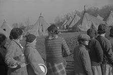 Possibly: Refugees lined up at meal time in the camp for white flood...Forest City, Arkansas, 1937. Creator: Walker Evans