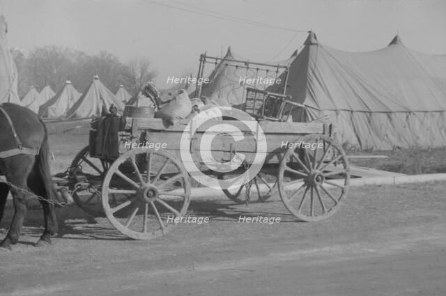 Possibly: Refugees lined up at meal time in the camp for white..., Forest City, Arkansas, 1937. Creator: Walker Evans.
