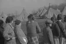 Possibly: Refugees lined up at meal time in the camp for white flood...Forest City, Arkansas, 1937. Creator: Walker Evans