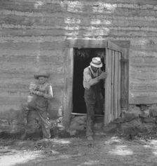 Possibly: Tobacco people take it easy..., Granville County, North Carolina, 1939. Creator: Dorothea Lange