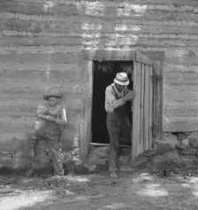 Possibly: Tobacco people take it easy..., Granville County, North Carolina, 1939. Creator: Dorothea Lange