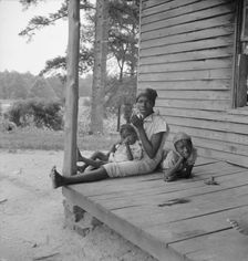 Possibly: Tobacco sharecropper's daughter getting eggs..., Person County, North Carolina, 1939. Creator: Dorothea Lange