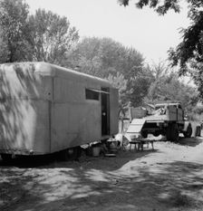Possibly: The house trailer and the youngest little girl, Washington, Yakima Valley, Toppenish, 1939 Creator: Dorothea Lange