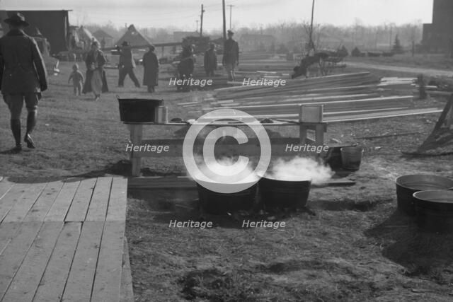 Possibly: The kitchen in the camp for white flood refugees at Forrest City, Arkansas, 1937. Creator: Walker Evans.
