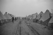Possibly: The kitchen in the camp for white flood refugees at Forrest City, Arkansas, 1937. Creator: Walker Evans