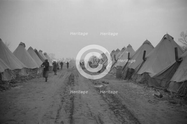 Possibly: The kitchen in the camp for white flood refugees at Forrest City, Arkansas, 1937. Creator: Walker Evans.