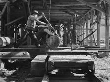 Possibly: The sawmill in operation, Ola self-help sawmill co-op, Gem County, Idaho, 1939. Creator: Dorothea Lange