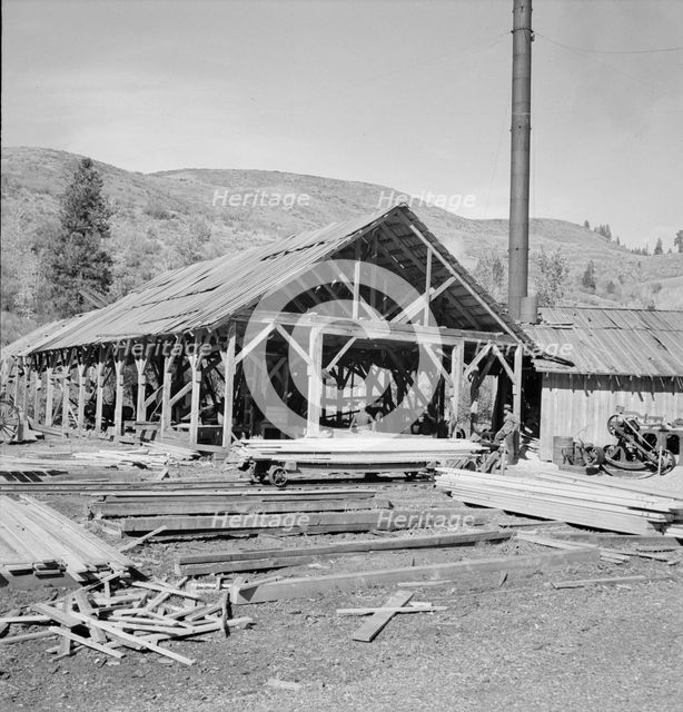 Possibly: The sawmill in operation, Ola self-help sawmill co-op, Gem County, Idaho, 1939. Creator: Dorothea Lange.