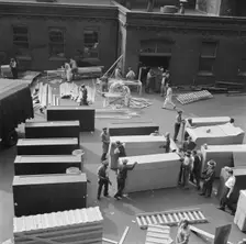 Possibly: United States government workers and carpenters making crates..., Washington, D.C., 1942. Creator: Gordon Parks
