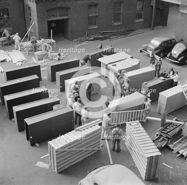 Possibly: United States government workers and carpenters making crates..., Washington, D.C., 1942. Creator: Gordon Parks.