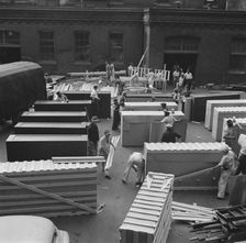 Possibly: United States government workers and carpenters making crates..., Washington, D.C., 1942. Creator: Gordon Parks