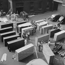 Possibly: United States government workers and carpenters making crates..., Washington, D.C., 1942. Creator: Gordon Parks
