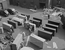 Possibly: United States government workers and carpenters making crates..., Washington, D.C., 1942. Creator: Gordon Parks