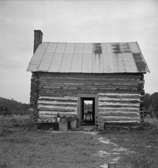 Possibly: Young sharecropper and his first child, Hillside Farm, Person County, North Carolina, 1939 Creator: Dorothea Lange