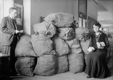Post Office Department - Dead Letter Mail, Supt. Marvin Mclean And Mrs. Clara R.A. Nelson, 1917. Creator: Harris & Ewing