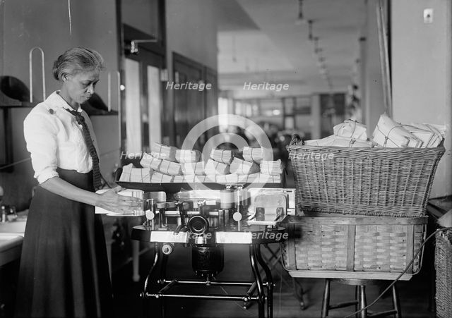 Post Office Department - Opening Machine, 1917. Creator: Harris & Ewing.