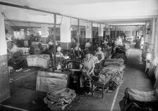 Post Office Department - Repairing Mailbags, 1914. Creator: Harris & Ewing