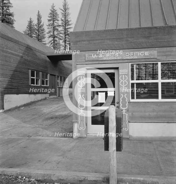 Post office in company lumber town, Gilchrist, Oregon, 1939. Creator: Dorothea Lange.
