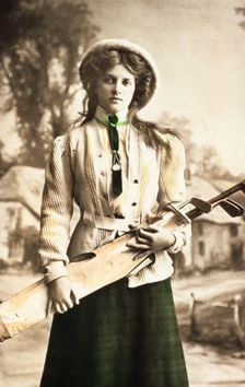 Postcard of a woman golfer, c1912. Creator: Unknown