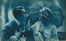Postcard of romantic vintage couple, in blue