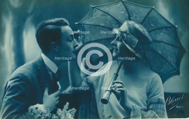Postcard of romantic vintage couple, in blue. Artist: Unknown