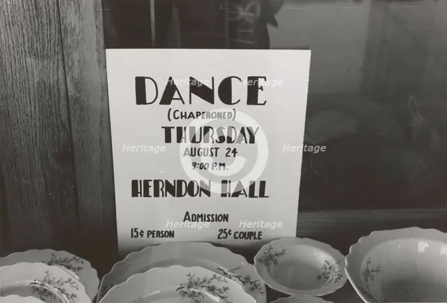 Poster in drugstore window, Syracuse, Kansas,  1939-08. Creator: Russell Lee.