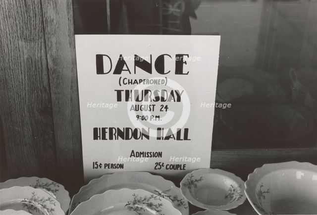 Poster in drugstore window, Syracuse, Kansas,  1939-08. Creator: Russell Lee.