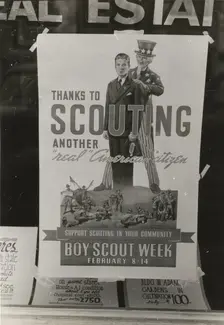 Poster in real estate window, Harlingen, Texas, 1939-02. Creator: Russell Lee