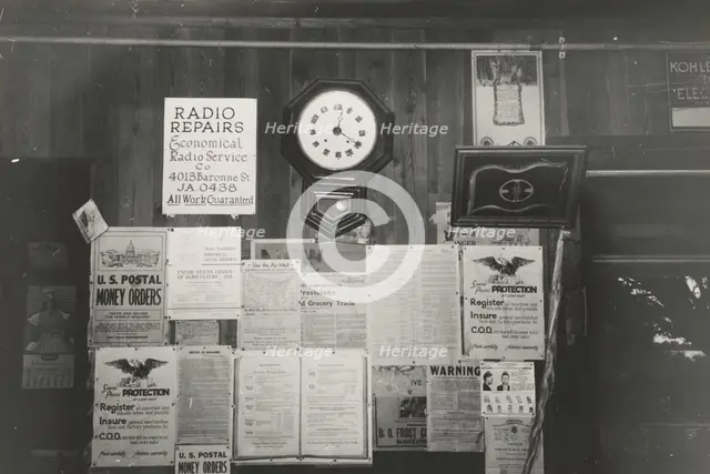 Posters and decorations in combined general store and post office, Olga, Louisiana,  1938-09. Creator: Russell Lee.