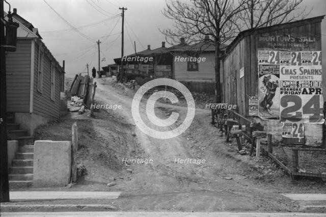 Posters covering a building near Lynchburg to advertise a Downie Bros. circus, 1936. Creator: Walker Evans.