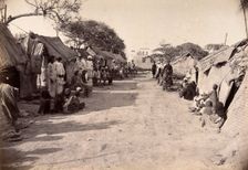 Pathway through the centre of a segregation camp during bubonic plague outbreak, Karachi, India,1897 Creator: Unknown