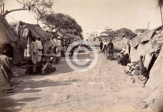 Pathway through the centre of a segregation camp during bubonic plague outbreak, Karachi, India,1897 Creator: Unknown.