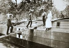 Patients being taken on board a hospital barge, Somme campaign, France, World War I, 1916. Creator: Unknown