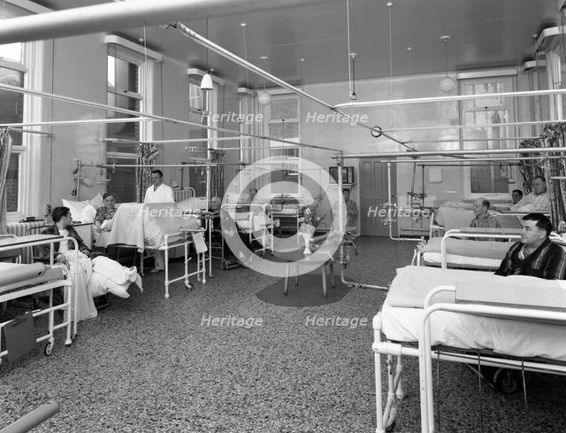 Patients on a men's surgical ward, Montague Hospital, Mexborough, South Yorkshire, 1968. Creator: Michael Walters.