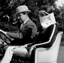 Patrick Macnee & Diana Rigg in 1905 Vauxhall filming the Avengers at Beaulieu 1966. Creator: Unknown