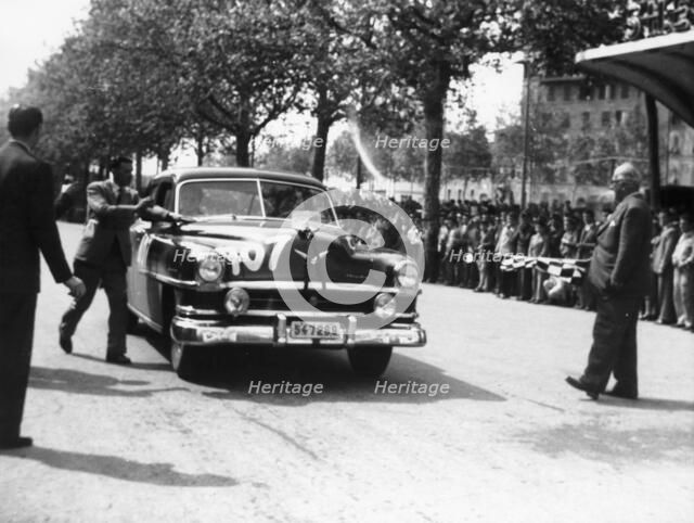 Paul Frere in a Chrysler Saloon V8, in the Mille Miglia, 1953. Artist: Unknown