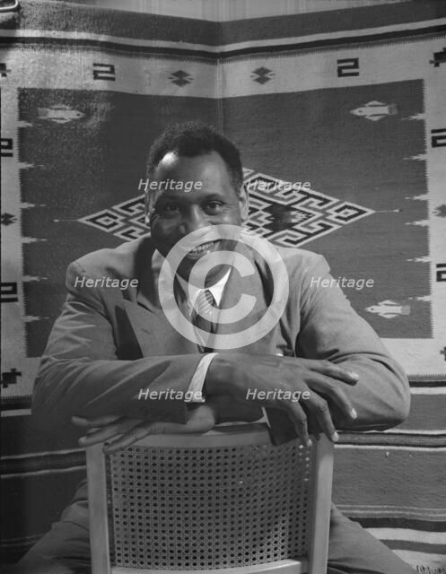 Paul Robeson, baritone, Washington, D.C, 1942. Creator: Gordon Parks.