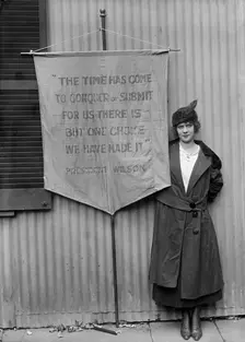 Pauline Floyd, with Banner, 1917. Creator: Harris & Ewing