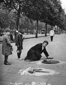 Pavement artist, Embankment, London, 1926-1927. Artist: McLeish