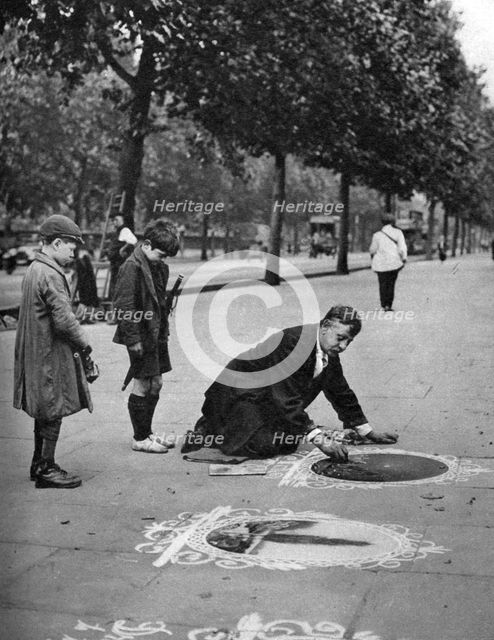 Pavement artist, Embankment, London, 1926-1927. Artist: McLeish