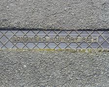 Pavement rainwater gully cover plate made by Longmead Foundry, Bath, Swindon, Wiltshire, 2006. Artist: Peter Williams